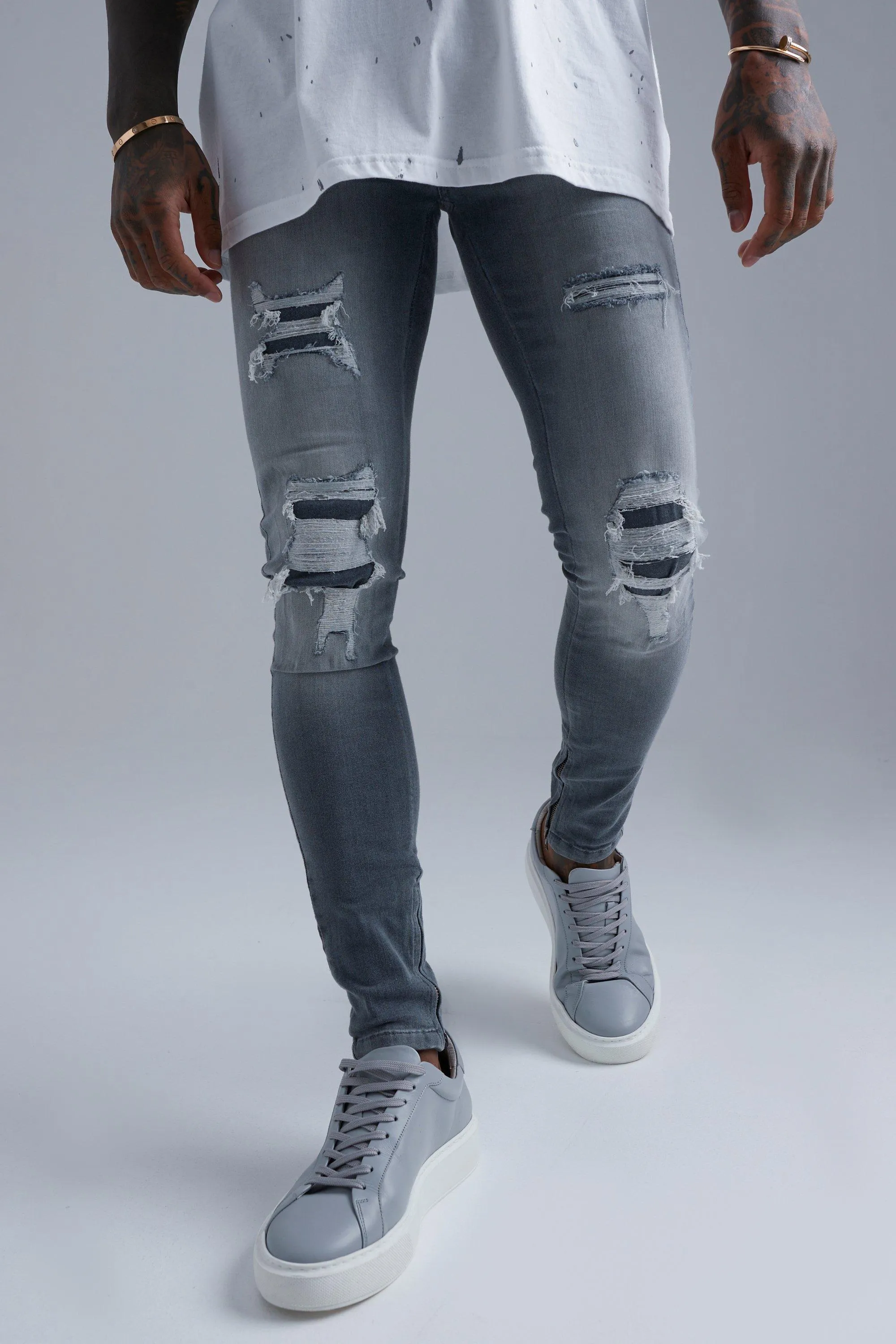 Super Skinny All Over Rip And Repair Jeans